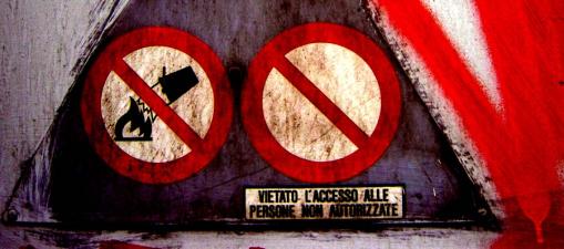 Signs in th city Italian warning signs and graffiti
